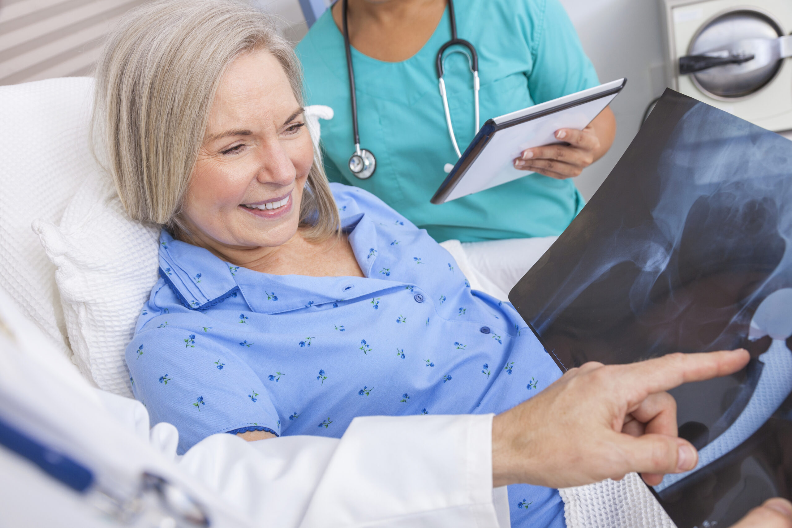health insurance and hip replacements, Happy,Senior,Woman,Patient,Recovering,In,Hospital,Bed, hip replacement