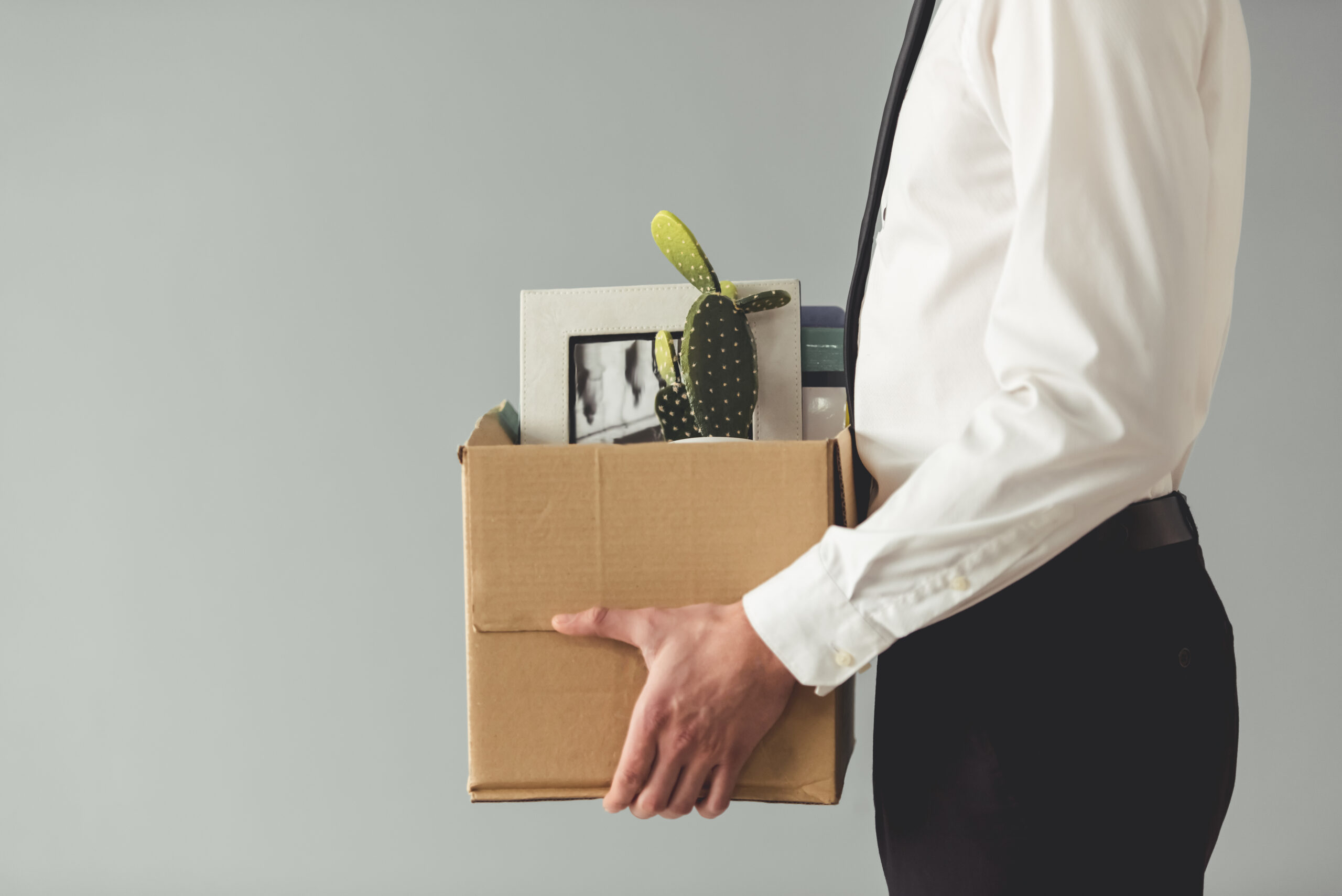Getting,Fired.,Cropped,Image,Of,Handsome,Businessman,In,Formal,Wear