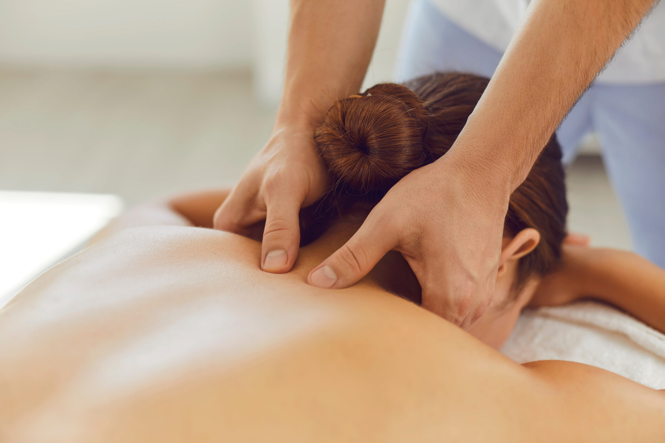 Close-up,Of,Woman,Lying,On,Massage,Table,Face,Down,Enjoying